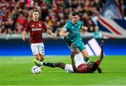 30 July 2024; Josh Honohan of Shamrock Rovers in action against Tomáš Wiesner, left, and Victor Olatunji of Sparta Prague during the UEFA Champions League Second Qualifying Round second leg match between Sparta Prague and Shamrock Rovers at Letná Stadium in Prague, Czechia. Photo by Pavel Lebeda/Sportsfile