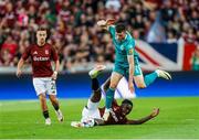 30 July 2024; Josh Honohan of Shamrock Rovers in action against Tomáš Wiesner, left, and Victor Olatunji of Sparta Prague during the UEFA Champions League Second Qualifying Round second leg match between Sparta Prague and Shamrock Rovers at Letná Stadium in Prague, Czechia. Photo by Pavel Lebeda/Sportsfile