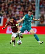 30 July 2024; Josh Honohan of Shamrock Rovers in action against David Pavelka of Sparta Prague during the UEFA Champions League Second Qualifying Round second leg match between Sparta Prague and Shamrock Rovers at Letná Stadium in Prague, Czechia. Photo by Pavel Lebeda/Sportsfile