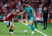 30 July 2024; Josh Honohan of Shamrock Rovers in action against Tomáš Wiesner of Sparta Prague during the UEFA Champions League Second Qualifying Round second leg match between Sparta Prague and Shamrock Rovers at Letná Stadium in Prague, Czechia. Photo by Pavel Lebeda/Sportsfile
