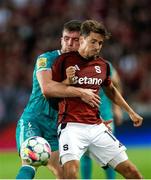 30 July 2024; Josh Honohan of Shamrock Rovers in action against Lukáš Sadílek of Sparta Prague during the UEFA Champions League Second Qualifying Round second leg match between Sparta Prague and Shamrock Rovers at Letná Stadium in Prague, Czechia. Photo by Pavel Lebeda/Sportsfile