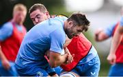 31 July 2024; Ross Byrne and Scott Penny during a Leinster rugby training session at UCD in Dublin. Photo by Ramsey Cardy/Sportsfile
