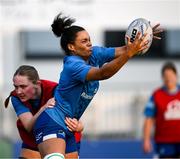 30 July 2024; Eimear Corri is tackled by Jane Neill during Leinster rugby women's season launch at Energia Park in Dublin. Photo by Shauna Clinton/Sportsfile