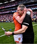 28 July 2024; Armagh manager Kieran McGeeney celebrates with Jarly Óg Burns after their side's victory in the GAA Football All-Ireland Senior Championship Final match between Armagh and Galway at Croke Park in Dublin. Photo by Piaras Ó Mídheach/Sportsfile