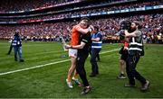 28 July 2024; Armagh manager Kieran McGeeney celebrates with Jarly Óg Burns after their side's victory in the GAA Football All-Ireland Senior Championship Final match between Armagh and Galway at Croke Park in Dublin. Photo by Piaras Ó Mídheach/Sportsfile