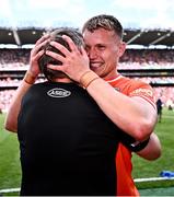 28 July 2024; Rian O'Neill of Armagh celebrates with his manager Kieran McGeeney, left, after their side's victory in the GAA Football All-Ireland Senior Championship Final match between Armagh and Galway at Croke Park in Dublin. Photo by Piaras Ó Mídheach/Sportsfile