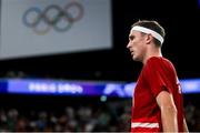 31 July 2024; Victor Axelsen of Team Denmark in action against Nhat Nguyen of Team Ireland during the men's singles group P match at the Porte de la Chapelle Arena during the 2024 Paris Summer Olympic Games in Paris, France. Photo by Stephen McCarthy/Sportsfile