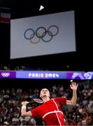 31 July 2024; Victor Axelsen of Team Denmark in action against Nhat Nguyen of Team Ireland during the men's singles group P match at the Porte de la Chapelle Arena during the 2024 Paris Summer Olympic Games in Paris, France. Photo by Stephen McCarthy/Sportsfile