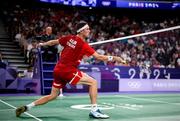 31 July 2024; Victor Axelsen of Team Denmark in action against Nhat Nguyen of Team Ireland during the men's singles group P match at the Porte de la Chapelle Arena during the 2024 Paris Summer Olympic Games in Paris, France. Photo by Stephen McCarthy/Sportsfile