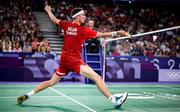31 July 2024; Victor Axelsen of Team Denmark in action against Nhat Nguyen of Team Ireland during the men's singles group P match at the Porte de la Chapelle Arena during the 2024 Paris Summer Olympic Games in Paris, France. Photo by Stephen McCarthy/Sportsfile