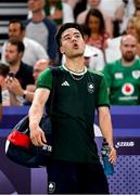 31 July 2024; Nhat Nguyen of Team Ireland reacts after his men's singles group P match against Victor Axelsen of Team Denmark at the Porte de la Chapelle Arena during the 2024 Paris Summer Olympic Games in Paris, France. Photo by Stephen McCarthy/Sportsfile