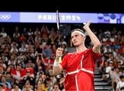 31 July 2024; Victor Axelsen of Team Denmark celebrates after winning his men's singles group P match against Nhat Nguyen of Team Ireland at the Porte de la Chapelle Arena during the 2024 Paris Summer Olympic Games in Paris, France. Photo by Stephen McCarthy/Sportsfile