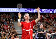 31 July 2024; Victor Axelsen of Team Denmark celebrates after winning his men's singles group P match against Nhat Nguyen of Team Ireland at the Porte de la Chapelle Arena during the 2024 Paris Summer Olympic Games in Paris, France. Photo by Stephen McCarthy/Sportsfile