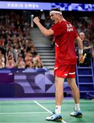31 July 2024; Victor Axelsen of Team Denmark celebrates after winning his men's singles group P match against Nhat Nguyen of Team Ireland at the Porte de la Chapelle Arena during the 2024 Paris Summer Olympic Games in Paris, France. Photo by Stephen McCarthy/Sportsfile