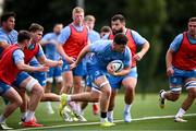 31 July 2024; James Culhane, centre, during a Leinster rugby training session at UCD in Dublin. Photo by Ramsey Cardy/Sportsfile