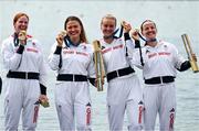 31 July 2024; The Team Great Britain team, from left, Georgina Brayshaw, Lola Anderson, Hannah Scott and Lauren Henry, with their gold medals after winning the women's quadruple sculls final at Vaires-sur-Marne Nautical Stadium during the 2024 Paris Summer Olympic Games in Paris, France. Photo by Brendan Moran/Sportsfile