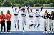 31 July 2024; The Team Great Britain team, from left, Georgina Brayshaw, Lola Anderson, Hannah Scott and Lauren Henry, celebrate winning a gold medal in the women's quadruple sculls final at Vaires-sur-Marne Nautical Stadium during the 2024 Paris Summer Olympic Games in Paris, France. Photo by Brendan Moran/Sportsfile