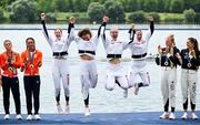 31 July 2024; The Team Great Britain team, from left, Georgina Brayshaw, Lola Anderson, Hannah Scott and Lauren Henry, celebrate winning a gold medal in the women's quadruple sculls final at Vaires-sur-Marne Nautical Stadium during the 2024 Paris Summer Olympic Games in Paris, France. Photo by Brendan Moran/Sportsfile