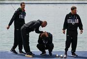 31 July 2024; The Team Italy team, from left, Giacomo Gentili, Andrea Panizza, Luca Rambaldi and Luca Chiumento with their silver medals after finishing second in the men's quadruple sculls final as Team Italy look on at Vaires-sur-Marne Nautical Stadium during the 2024 Paris Summer Olympic Games in Paris, France. Photo by Brendan Moran/Sportsfile