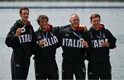 31 July 2024; The Team Italy team, from left, Giacomo Gentili, Andrea Panizza, Luca Rambaldi and Luca Chiumento with their silver medals after finishing second in the men's quadruple sculls final as Team Italy look on at Vaires-sur-Marne Nautical Stadium during the 2024 Paris Summer Olympic Games in Paris, France. Photo by Brendan Moran/Sportsfile