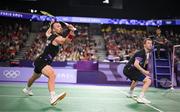 31 July 2024; Anders Skaarup Rasmussen, left, and Kim Astrup of Team Denmark in action against Takuro Hoki and Yugo Kobayashi of Team Japan during the men's singles group P match at the Porte de la Chapelle Arena during the 2024 Paris Summer Olympic Games in Paris, France. Photo by Stephen McCarthy/Sportsfile