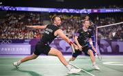 31 July 2024; Anders Skaarup Rasmussen, left, and Kim Astrup of Team Denmark in action against Takuro Hoki and Yugo Kobayashi of Team Japan during the men's singles group P match at the Porte de la Chapelle Arena during the 2024 Paris Summer Olympic Games in Paris, France. Photo by Stephen McCarthy/Sportsfile