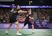 31 July 2024; Anders Skaarup Rasmussen, left, and Kim Astrup of Team Denmark in action against Takuro Hoki and Yugo Kobayashi of Team Japan during the men's singles group P match at the Porte de la Chapelle Arena during the 2024 Paris Summer Olympic Games in Paris, France. Photo by Stephen McCarthy/Sportsfile