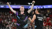 31 July 2024; Kim Astrup, left, and Anders Skaarup Rasmussen of Team Denmark celebrate winning against Takuro Hoki and Yugo Kobayashi of Team Japan in the men's singles group P match at the Porte de la Chapelle Arena during the 2024 Paris Summer Olympic Games in Paris, France. Photo by Stephen McCarthy/Sportsfile