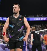 31 July 2024; Anders Skaarup Rasmussen, left, and Kim Astrup of Team Denmark celebrate winning against Takuro Hoki and Yugo Kobayashi of Team Japan in the men's singles group P match at the Porte de la Chapelle Arena during the 2024 Paris Summer Olympic Games in Paris, France. Photo by Stephen McCarthy/Sportsfile