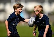 31 July 2024; Harry Casey, left, during the Bank of Ireland Leinster Rugby Summer Camp at St Mary's College RFC in Dublin. Photo by Harry Murphy/Sportsfile