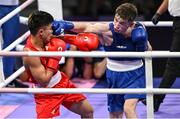 31 July 2024; Jude Gallagher of Team Ireland, right, in action against Carlo Paalam of Team Philippines during their men's 57kg preliminary round of 16 bout at the North Paris Arena during the 2024 Paris Summer Olympic Games in Paris, France. Photo by David Fitzgerald/Sportsfile