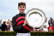 31 July 2024; Jockey Donagh Meyler celebrates with the trophy after winning the Tote Galway Plate on Pinkerton during day three of the Galway Races Summer Festival at Ballybrit Racecourse in Galway. Photo by Seb Daly/Sportsfile