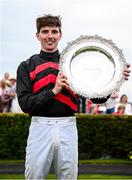 31 July 2024; Jockey Donagh Meyler celebrates with the trophy after winning the Tote Galway Plate on Pinkerton during day three of the Galway Races Summer Festival at Ballybrit Racecourse in Galway. Photo by Seb Daly/Sportsfile