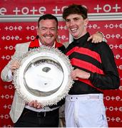 31 July 2024; Owner Philip Polly, left, and jockey Donagh Meyler celebrate with the trophy after sending out Pinkerton to win the Tote Galway Plate during day three of the Galway Races Summer Festival at Ballybrit Racecourse in Galway. Photo by Seb Daly/Sportsfile