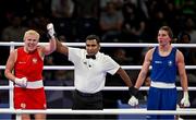 31 July 2024; Elzbieta Wojcik of Team Poland, left, after winning against Aoife O'Rourke of Team Ireland in their women's 75kg preliminary round 16 bout at the North Paris Arena during the 2024 Paris Summer Olympic Games in Paris, France. Photo by David Fitzgerald/Sportsfile