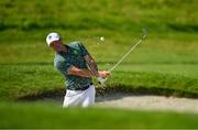 1 August 2024; Rory McIlroy of Team Ireland chips from the bunker on the second hole during round 1 of the men's golf singles at Le Golf National during the 2024 Paris Summer Olympic Games in Paris, France. Photo by Brendan Moran/Sportsfile