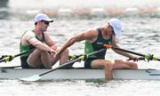1 August 2024; Philip Doyle, left, and Daire Lynch of Team Ireland after winning bronze in the men's double sculls A final at Vaires-sur-Marne Nautical Stadium during the 2024 Paris Summer Olympic Games in Paris, France. Photo by Stephen McCarthy/Sportsfile