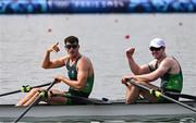 1 August 2024; Philip Doyle, right, and Daire Lynch of Team Ireland celebrate after winning bronze in the men's double sculls A final at Vaires-sur-Marne Nautical Stadium during the 2024 Paris Summer Olympic Games in Paris, France. Photo by Stephen McCarthy/Sportsfile