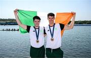 1 August 2024; Philip Doyle, right, and Daire Lynch of Team Ireland celebrate with their bronze medals after the men's double sculls A final at Vaires-sur-Marne Nautical Stadium during the 2024 Paris Summer Olympic Games in Paris, France. Photo by Stephen McCarthy/Sportsfile