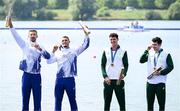 1 August 2024; From left, Men's double sculls A gold medallists Marian Florian Enache and Andrei Sabastian Cornea of Team Romania and bronze medallists Philip Doyle and Daire Lynch of Team Ireland during the awards ceremony at Vaires-sur-Marne Nautical Stadium during the 2024 Paris Summer Olympic Games in Paris, France. Photo by Stephen McCarthy/Sportsfile