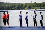 1 August 2024; From left, Men's double sculls A silver medallists Stef Broenik and Melvin Twellaar of Team Netherlands, gold medallists Marian Florian Enache and Andrei Sabastian Cornea of Team Romania and bronze medallists Philip Doyle and Daire Lynch of Team Ireland during the awards ceremony at Vaires-sur-Marne Nautical Stadium during the 2024 Paris Summer Olympic Games in Paris, France. Photo by Stephen McCarthy/Sportsfile