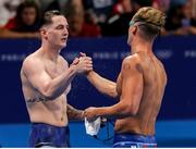 1 August 2024; Tom Fannon of Team Ireland celebrates with Mikel Schreuders of Team Aruba after finishing first in his men's 50m freestyle heat at the Paris La Défense Arena during the 2024 Paris Summer Olympic Games in Paris, France. Photo by Ian MacNicol/Sportsfile