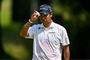 1 August 2024; Hideki Matsuyama Hideki of Team Japan acknowledges the gallery after a birdie during round 1 of the men's golf singles at Le Golf National during the 2024 Paris Summer Olympic Games in Paris, France. Photo by Brendan Moran/Sportsfile