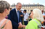 1 August 2024; Tánaiste, Minister for Foreign Affairs and Minister for Defence, Micheál Martin, TD, meets Elaine Haughey from Skibbereen in Cork at Fesport Festival at the Cháteau de Vincennes during the 2024 Paris Summer Olympic Games in Paris, France. Photo by Sam Barnes/Sportsfile