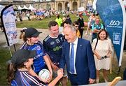 1 August 2024; Tánaiste, Minister for Foreign Affairs and Minister for Defence, Micheál Martin, TD, centre, meets members of Paris Gaels at Fesport Festival at the Cháteau de Vincennes during the 2024 Paris Summer Olympic Games in Paris, France. Photo by Sam Barnes/Sportsfile