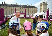 1 August 2024; Tánaiste, Minister for Foreign Affairs and Minister for Defence, Micheál Martin, TD, and Maud Pradella of Paris Gaels with attendees at Fesport Festival at the Cháteau de Vincennes during the 2024 Paris Summer Olympic Games in Paris, France. Photo by Sam Barnes/Sportsfile