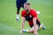 1 August 2024; Conor Keeley of St Patrick's Athletic warms up before the UEFA Conference League second qualifying round second leg match between FC Vaduz and St Patrick's Athletic at Rheinpark Stadion in Vaduz, Liechtenstein. Photo by Vedran Galijas/Sportsfile