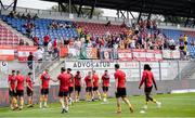 1 August 2024; St Patrick's Athletic supporters look on as players warm-up before the UEFA Conference League second qualifying round second leg match between FC Vaduz and St Patrick's Athletic at Rheinpark Stadion in Vaduz, Liechtenstein. Photo by Vedran Galijas/Sportsfile