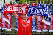 1 August 2024; Shelbourne supporter Joe Humphries, aged eight,  with a half and half scarf before the UEFA Conference League second qualifying round second leg match between Shelbourne and FC Zurich at Tolka Park in Dublin. Photo by Harry Murphy/Sportsfile