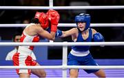 1 August 2024; Daina Moorehouse of Team Ireland, right, in action against Wassila Lkhadiri of Team France during their women's 50Kg round of 16 bout at the North Paris Arena during the 2024 Paris Summer Olympic Games in Paris, France. Photo by David Fitzgerald/Sportsfile